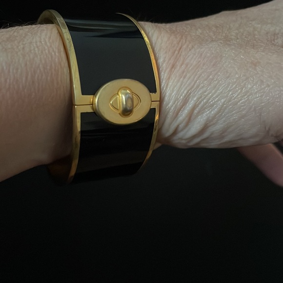 Beautiful Coach Wide Black and Gold Bangle with Turnlock Design. - Picture 6 of 6